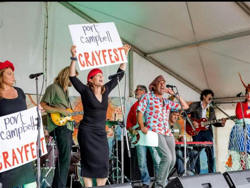 People on stage with Cray Fest sign