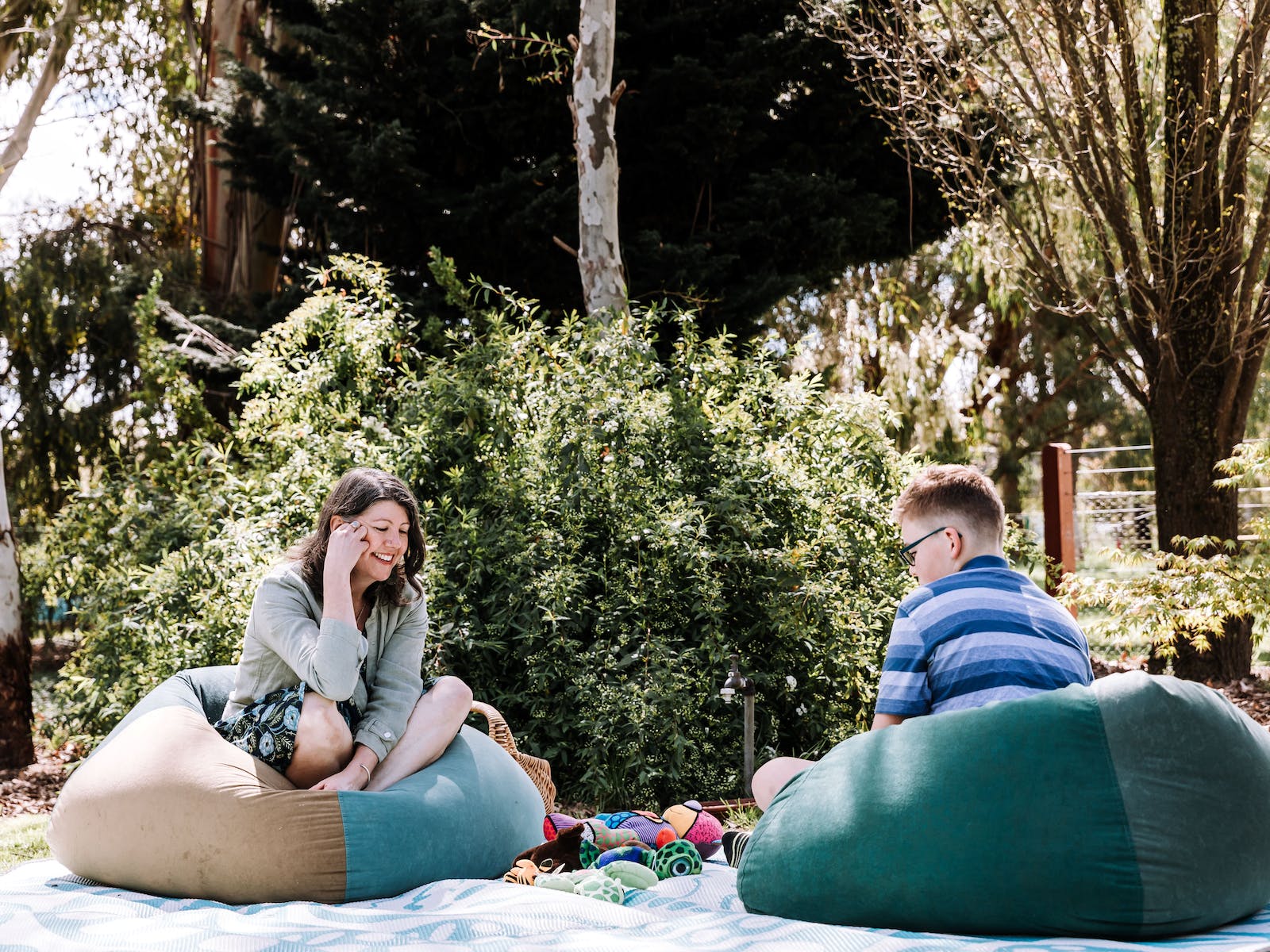 Young person therapy outdoors in bean bags