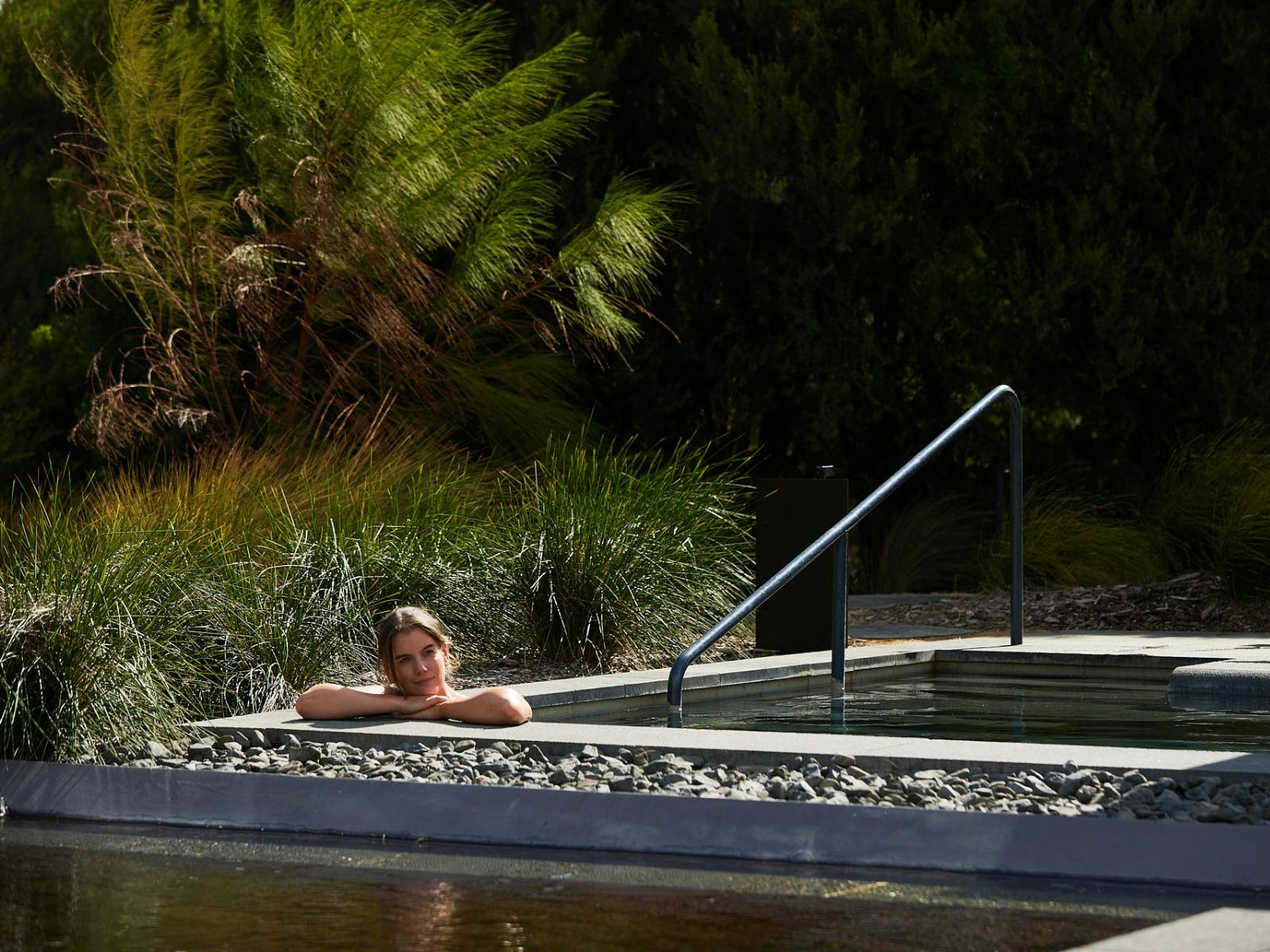 Women bathing in geo thermal pool