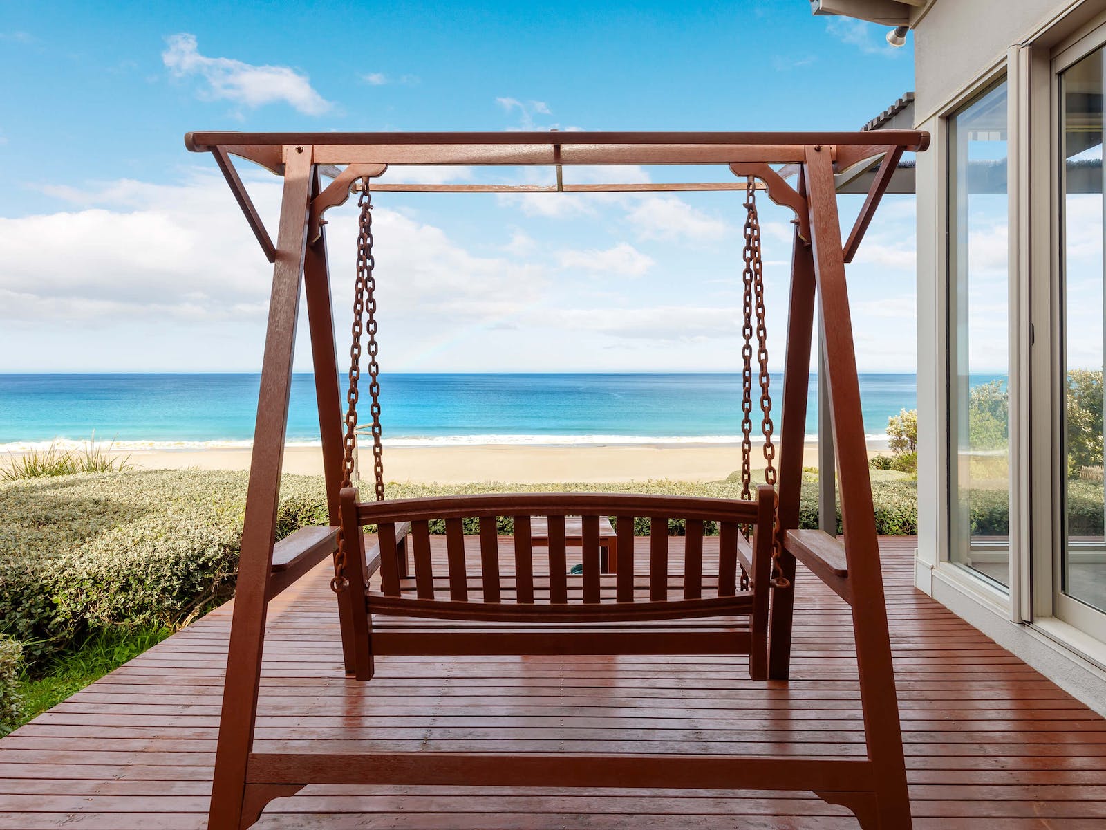 Every villa has its own swing on the front deck